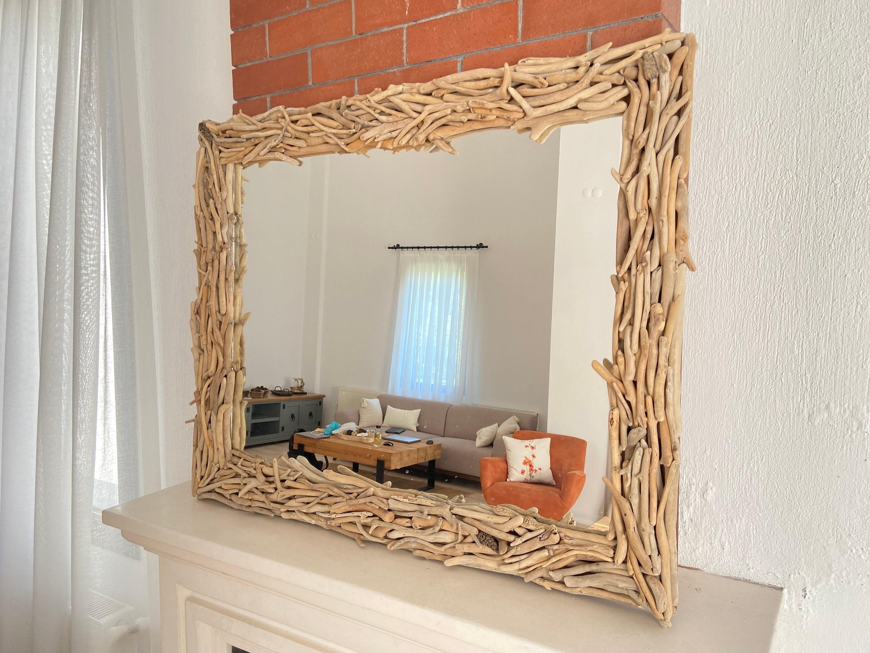 Driftwood mirrors ‌bring​ coastal elegance to a boho bathroom