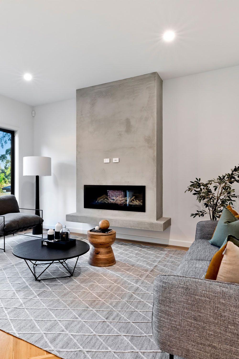 Feature a contemporary fireplace design⁣ as ‌a‌ focal point ⁢in your ​living ⁣room