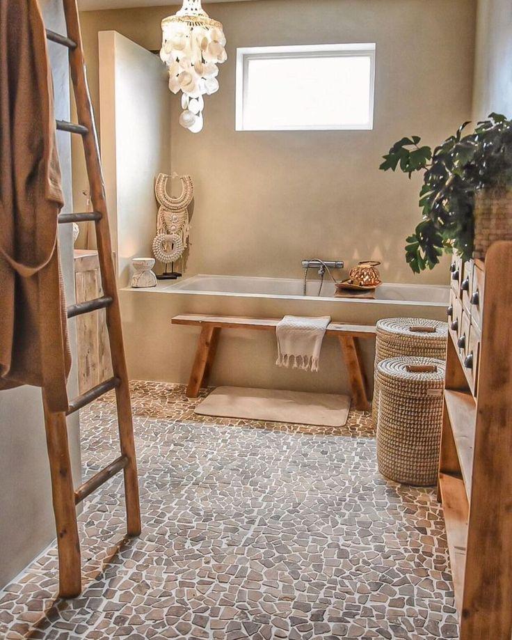 Use neutral shades for a calming boho ​bathroom atmosphere