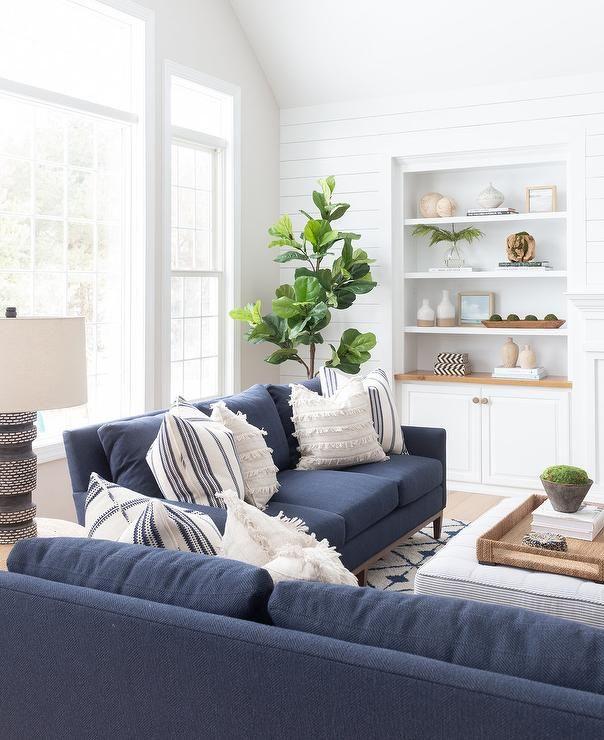 Utilize blue living room throw pillows for easy updates