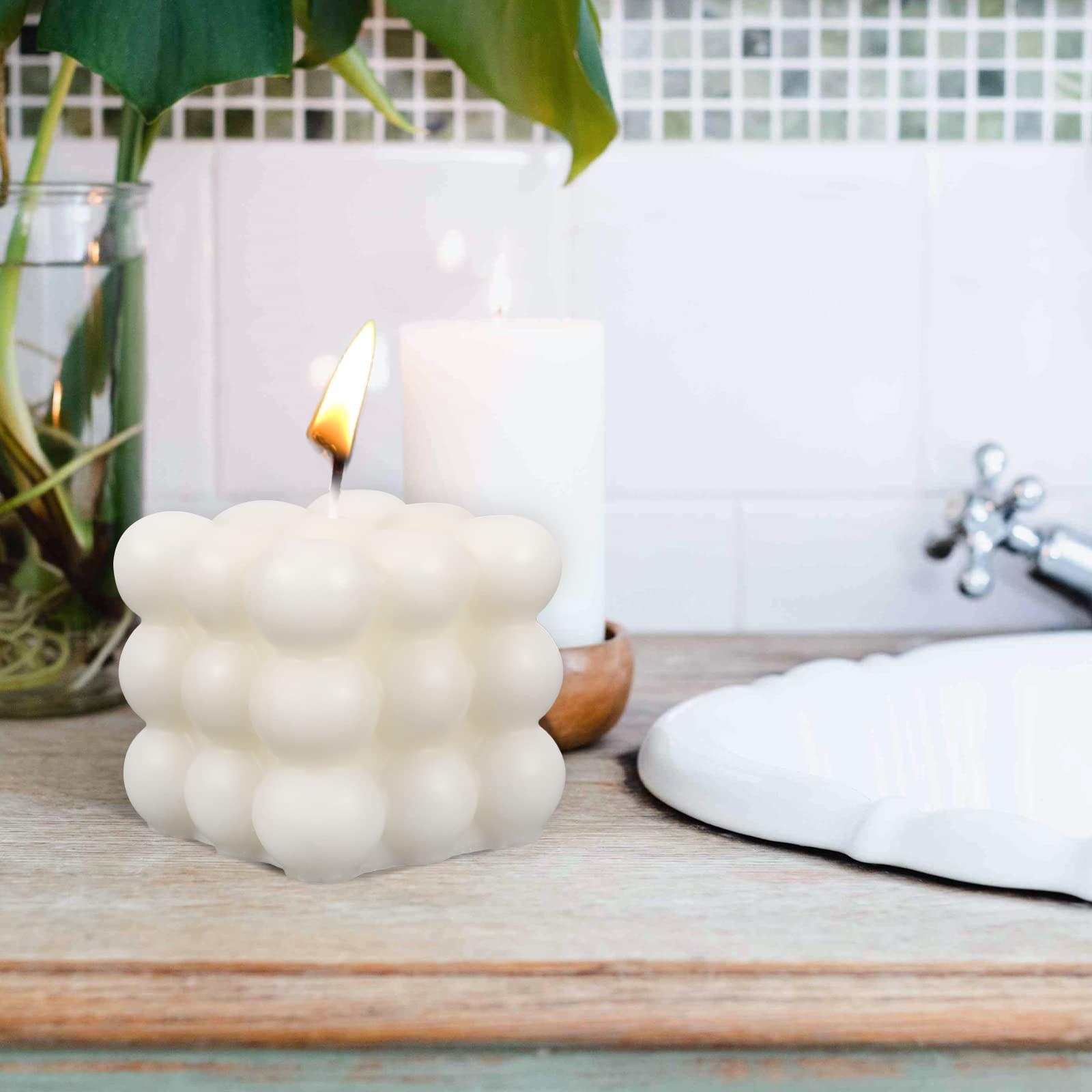 Scented⁣ candles add warmth to your tranquil boho bathroom