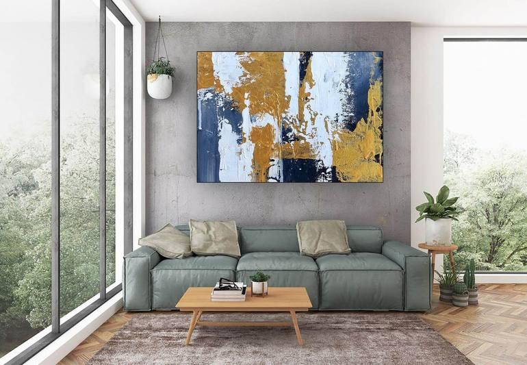 Hang oversized abstract art pieces for visual impact in your contemporary living room