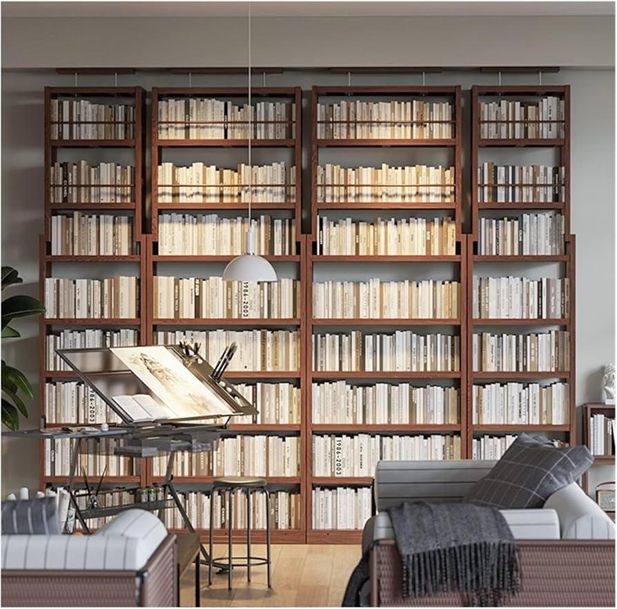 Book Lovers Living​ Room: Shelves of books transform walls into a cozy library