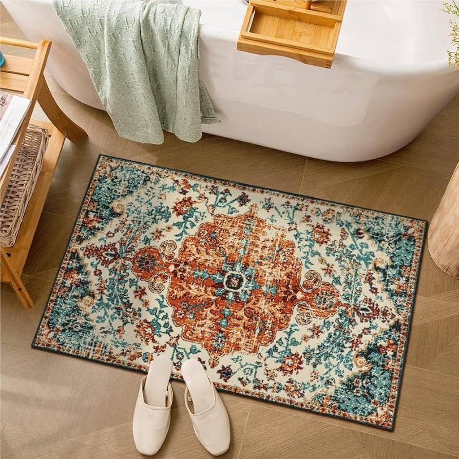 Vintage rugs bring warmth and⁣ color to your ​boho bathroom