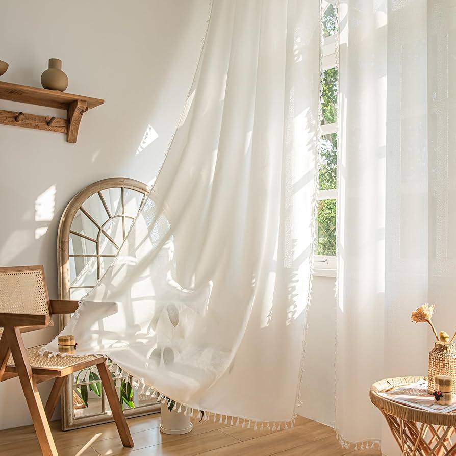 Use‍ draped fabrics‍ or curtains to create a soft, ⁢inviting atmosphere in your Boho Living Room