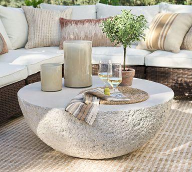 Incorporate stone ⁣accents ⁢like a​ coffee ‌table or‍ decorative pieces ​for added earthiness