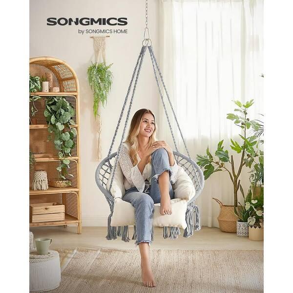 Add a comfy hammock chair for a laid-back nook in your Boho Living Room