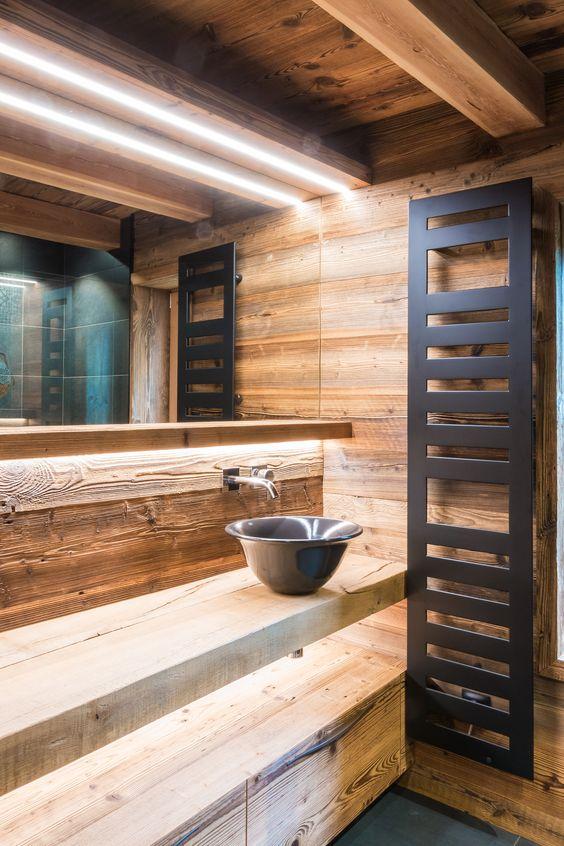 Utilize open shelving for stylish storage in a Chalet Bathroom