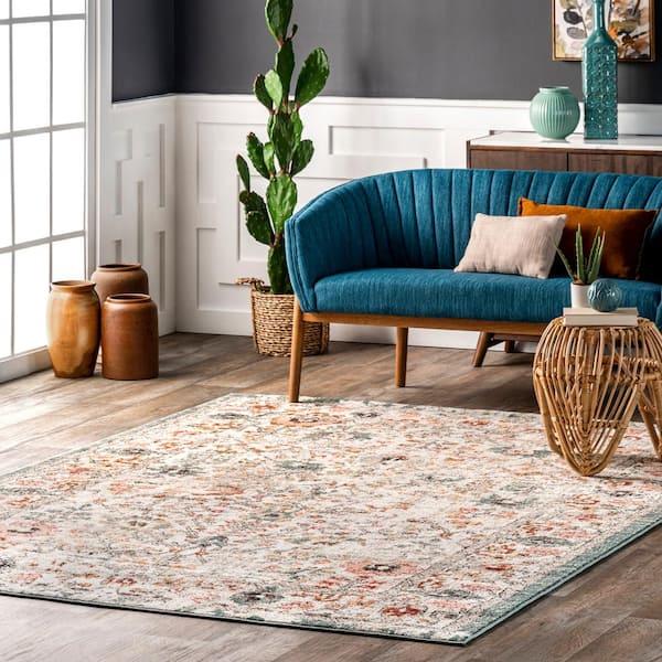 Start with ⁤a rich, textured area⁣ rug to define your vintage living room