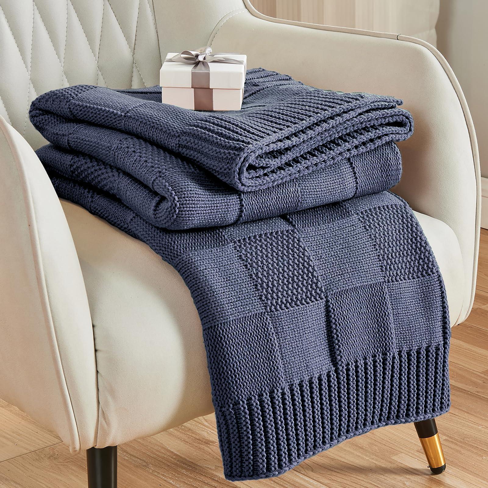 Layered textures: knitted throws in a <a href=