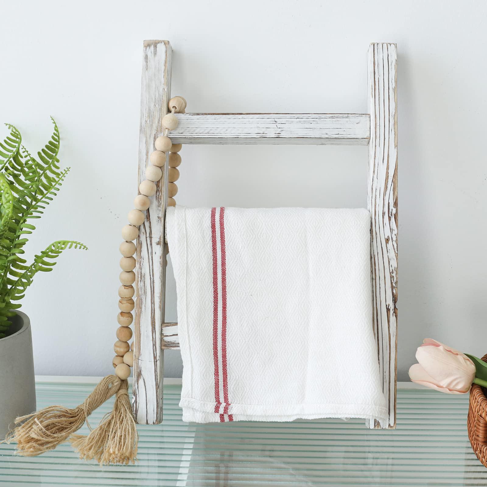 A rustic ladder ‍for towel display and charm