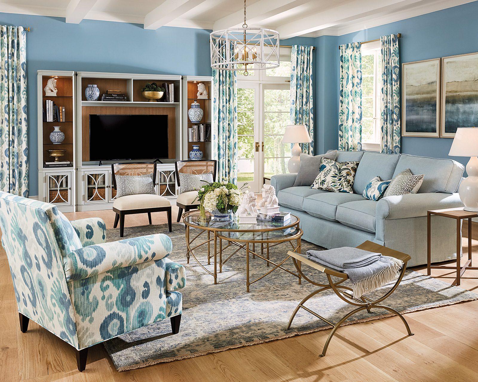 Arrange furniture for cozy conversations‍ in your blue living room