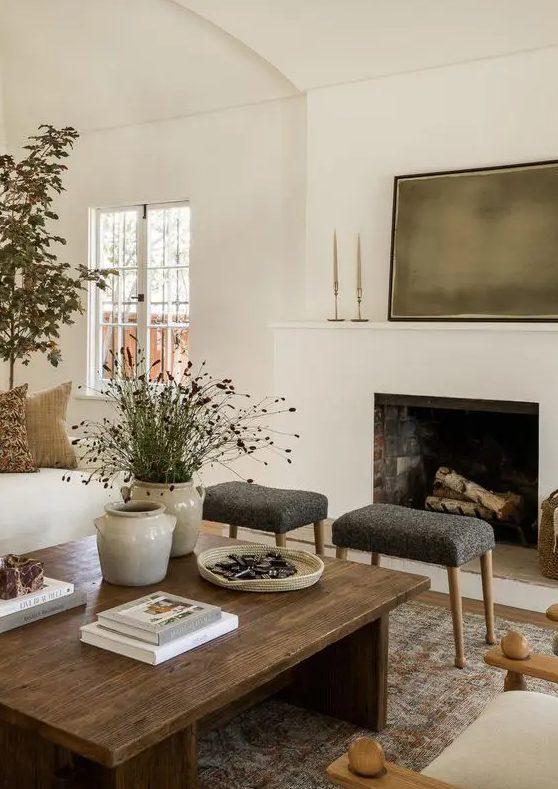 Integrate a cozy fireplace for warmth and ambiance in your Earthy Living Room