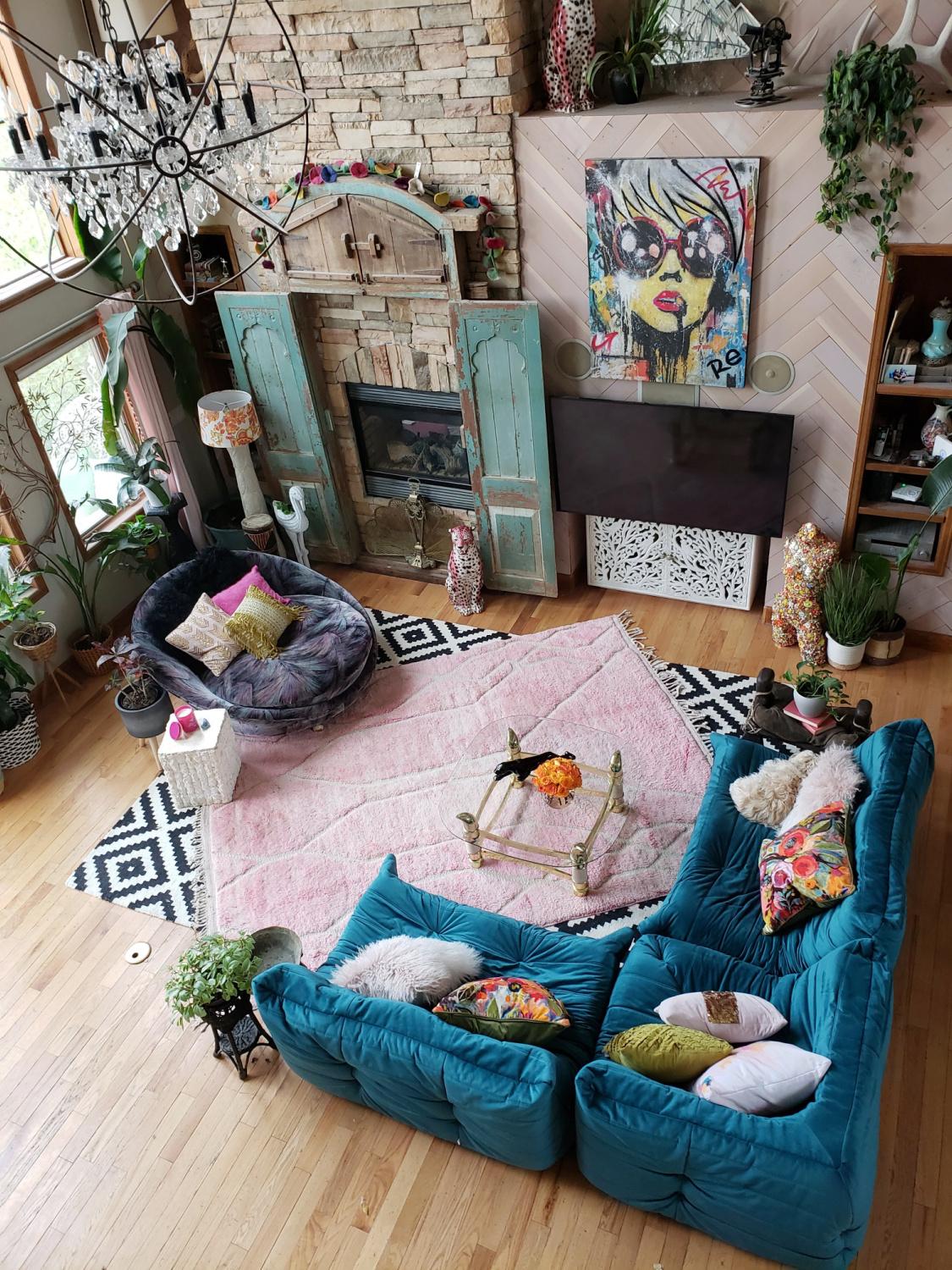 Layer rugs of ​various patterns to create depth in your ‌Boho Living Room