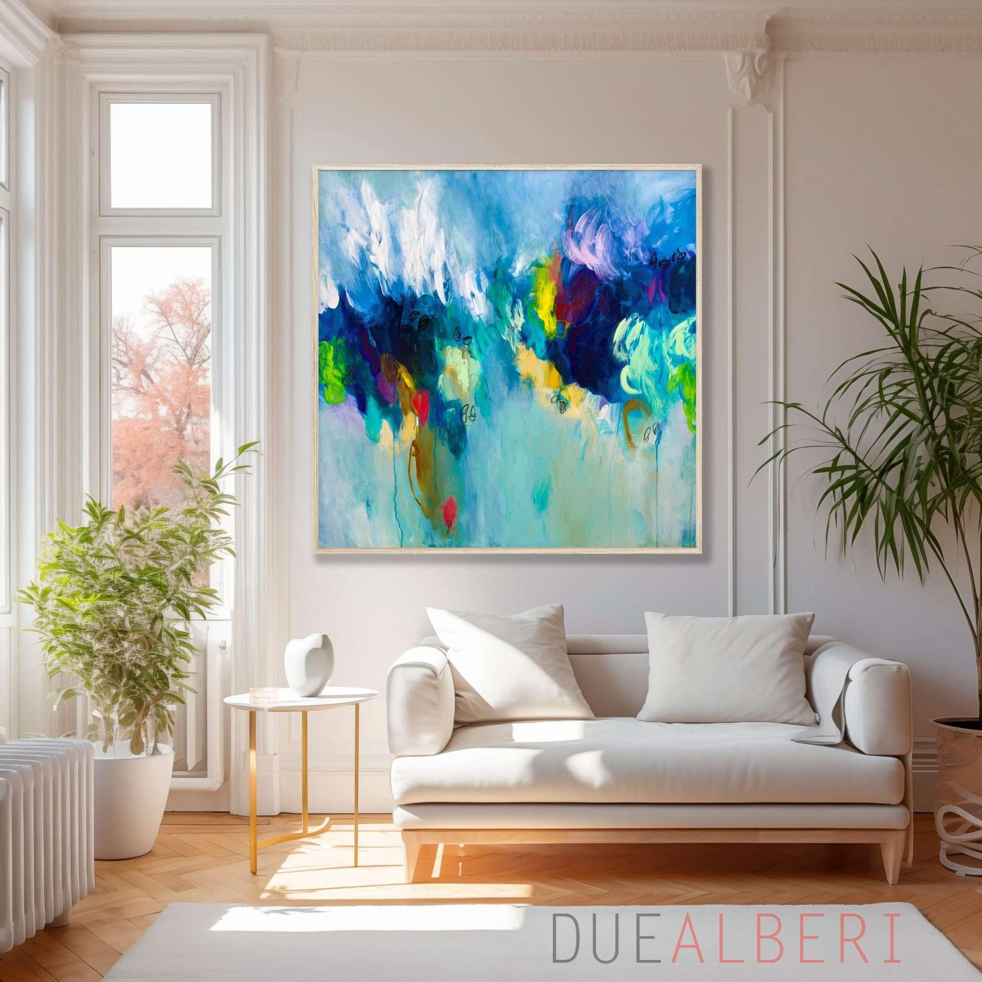 Eclectic​ blue living⁢ room adorned with colorful ⁢artwork