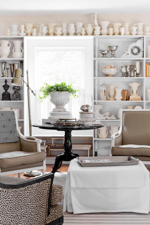 Display a collection of vintage ceramics on⁢ shelves or mantels ​in your living room