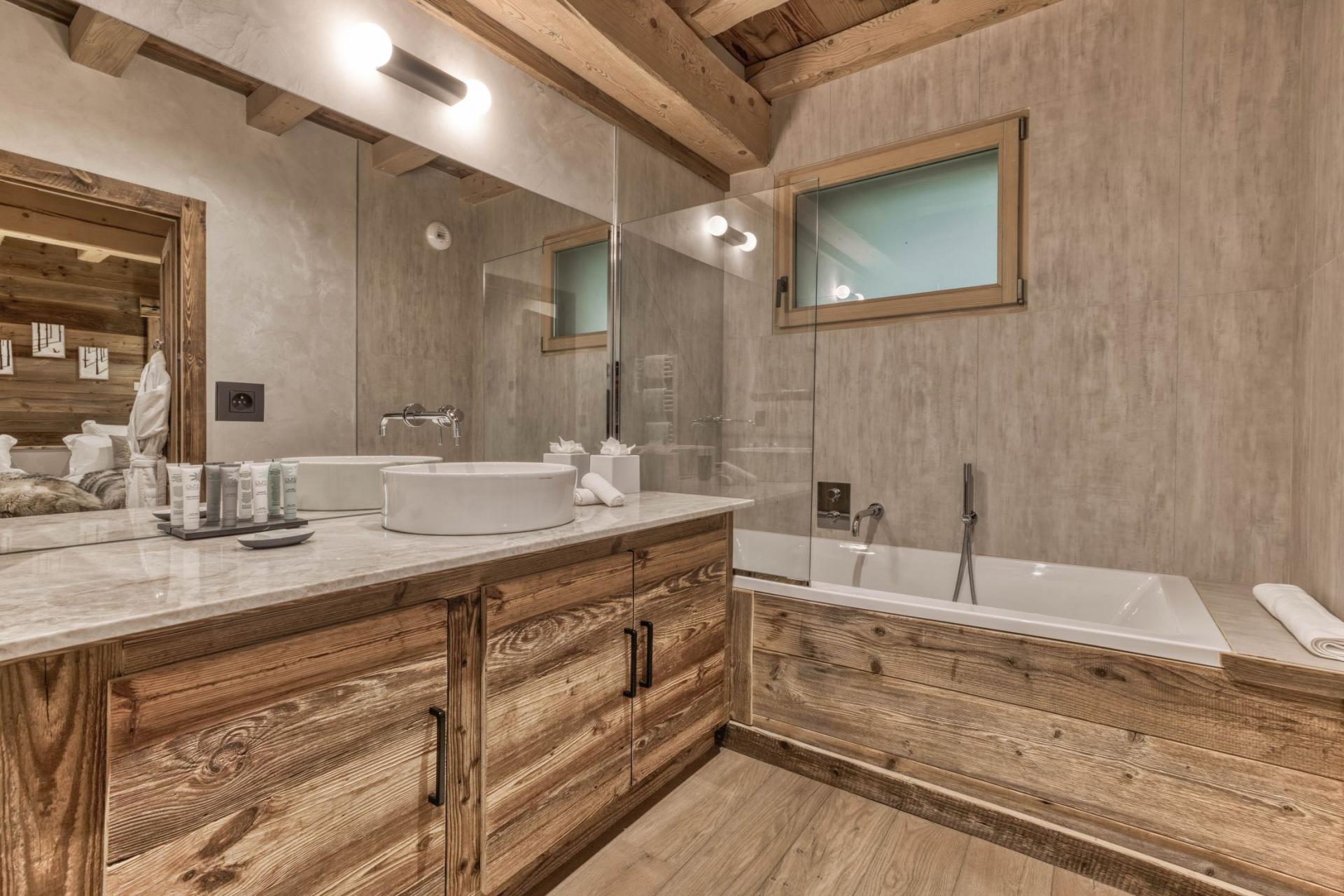 Add​ a small fireplace for warmth in your Chalet Bathroom