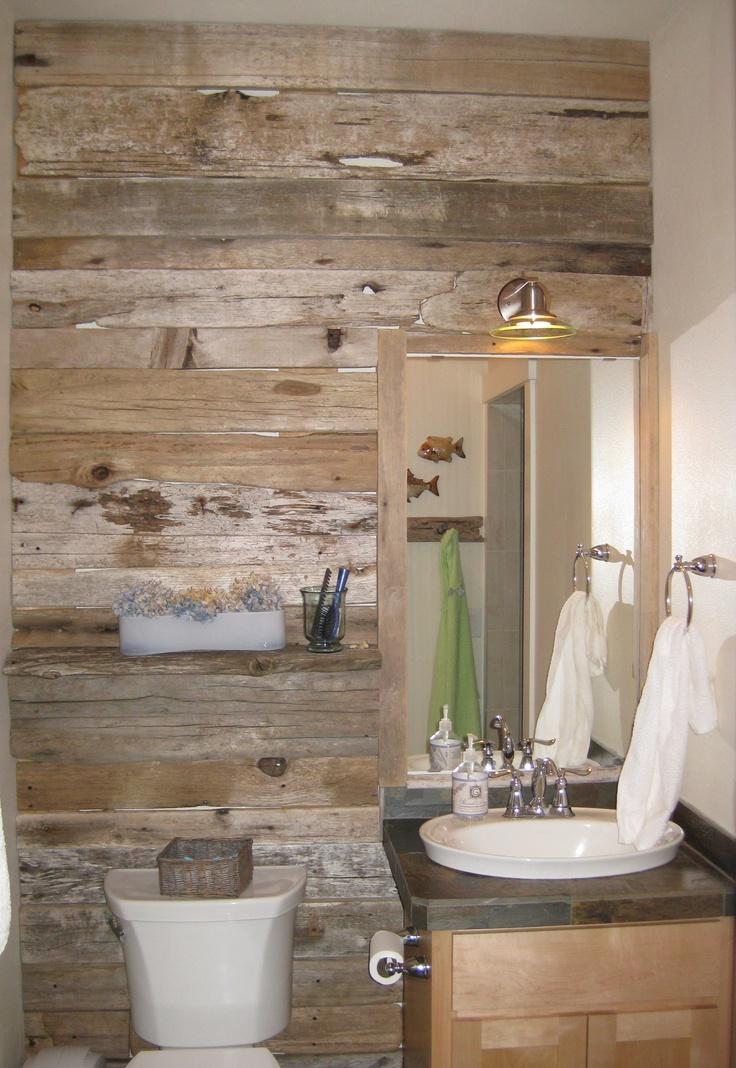 Driftwood accents add a coastal touch to your boho bathroom