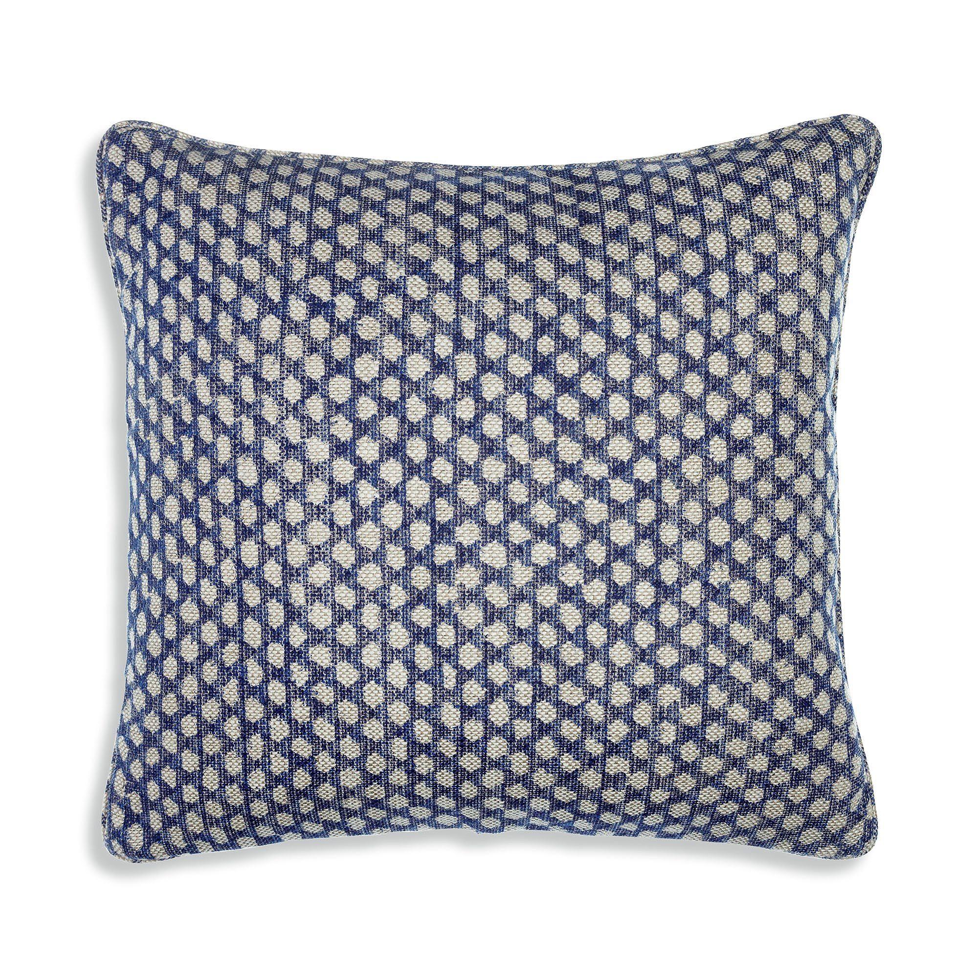 Opt for blue patterned cushions to enhance your blue ‍living room