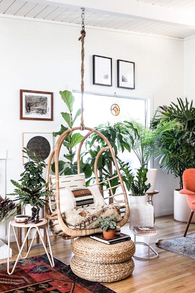 Create a reading‌ nook by adding a hammock chair to ‍your Boho ‍Living Room