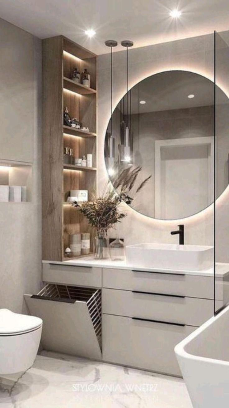 Use oversized mirrors to enhance the space in your Chalet Bathroom