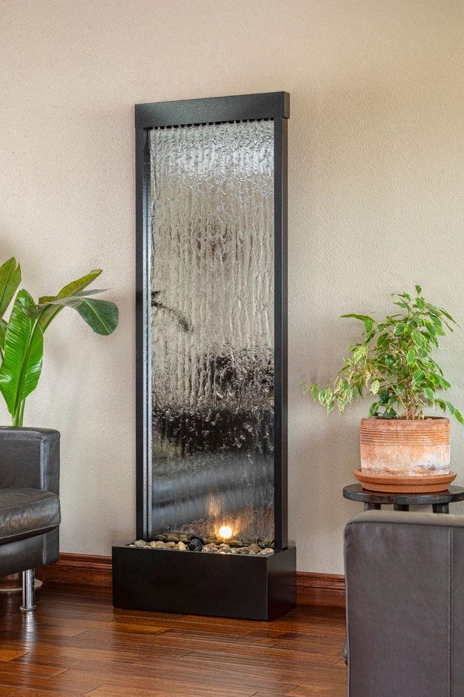 Opt for a ​corner with a small indoor fountain to enhance tranquility in your living ‍room