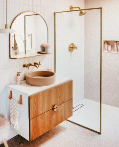 Copper accents to bring warmth into your boho bathroom