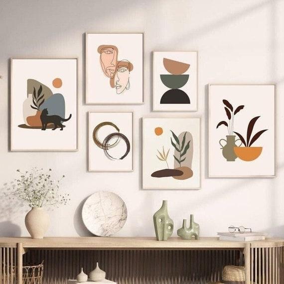 Design a gallery wall featuring diverse ​artwork in your⁢ Boho Living ⁢Room