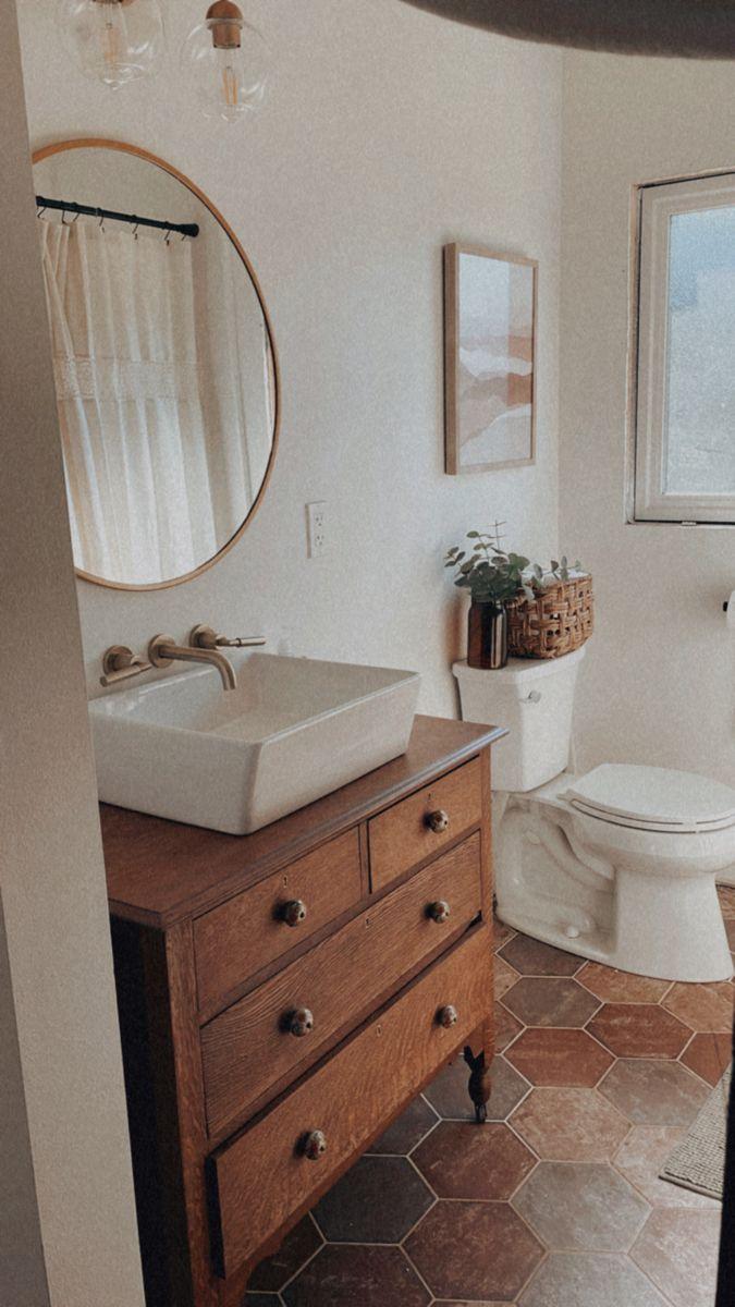 Earthy tones create a ‌calming atmosphere in your boho bathroom