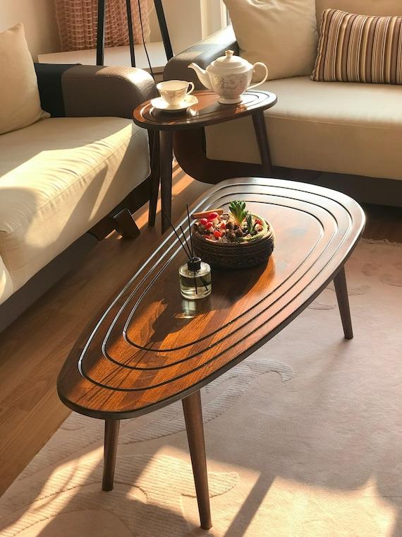 Choose a classic coffee table to anchor the design of your vintage living room