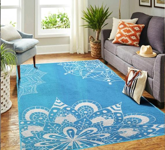 Choose a vibrant ⁣blue rug to tie the room together