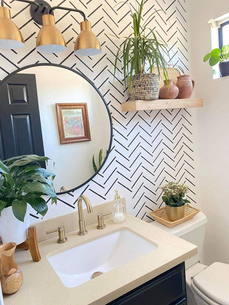 Add a​ statement wall ​with ‍wallpaper for a bold boho bathroom