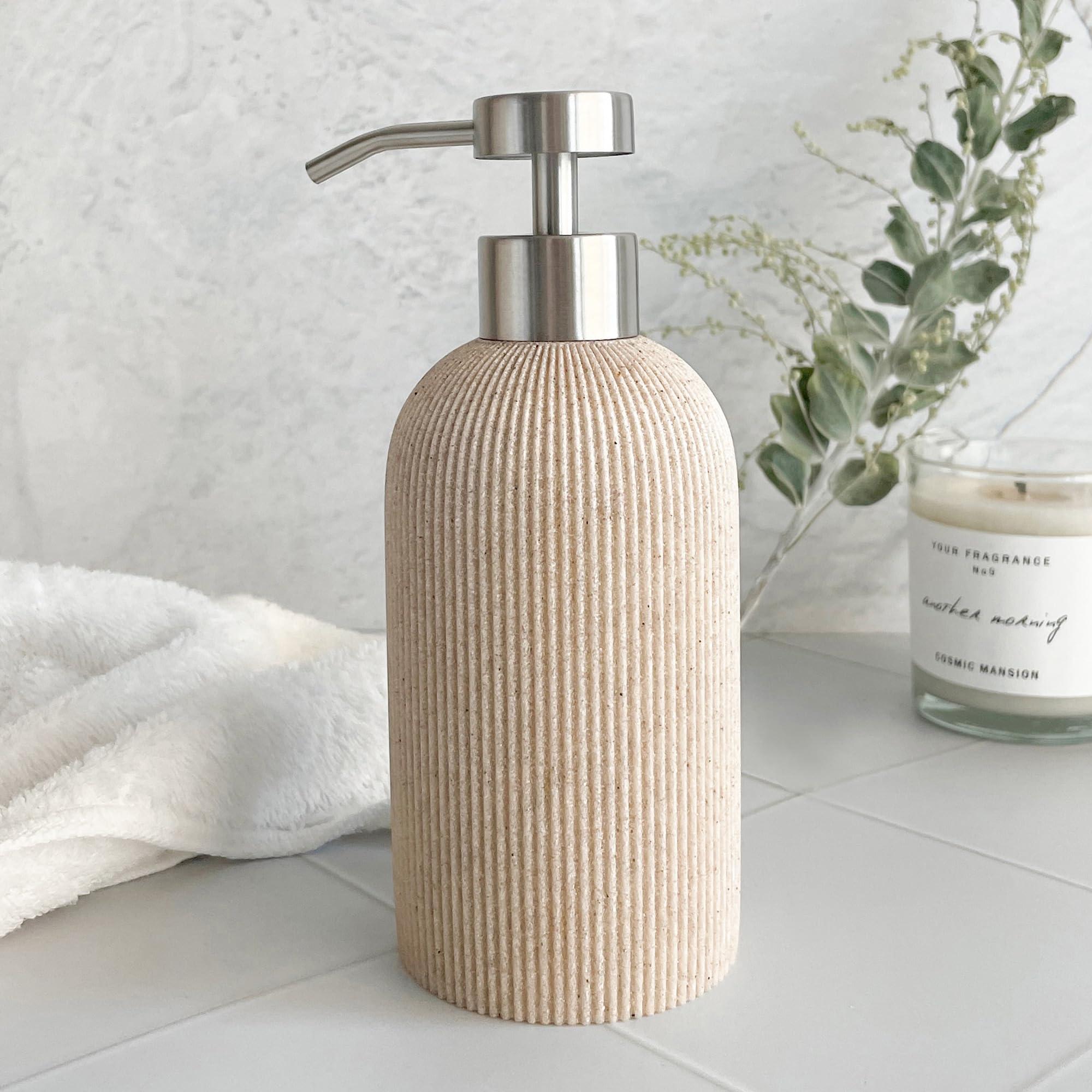 Natural stone soap dispensers for a chic boho bathroom aesthetic