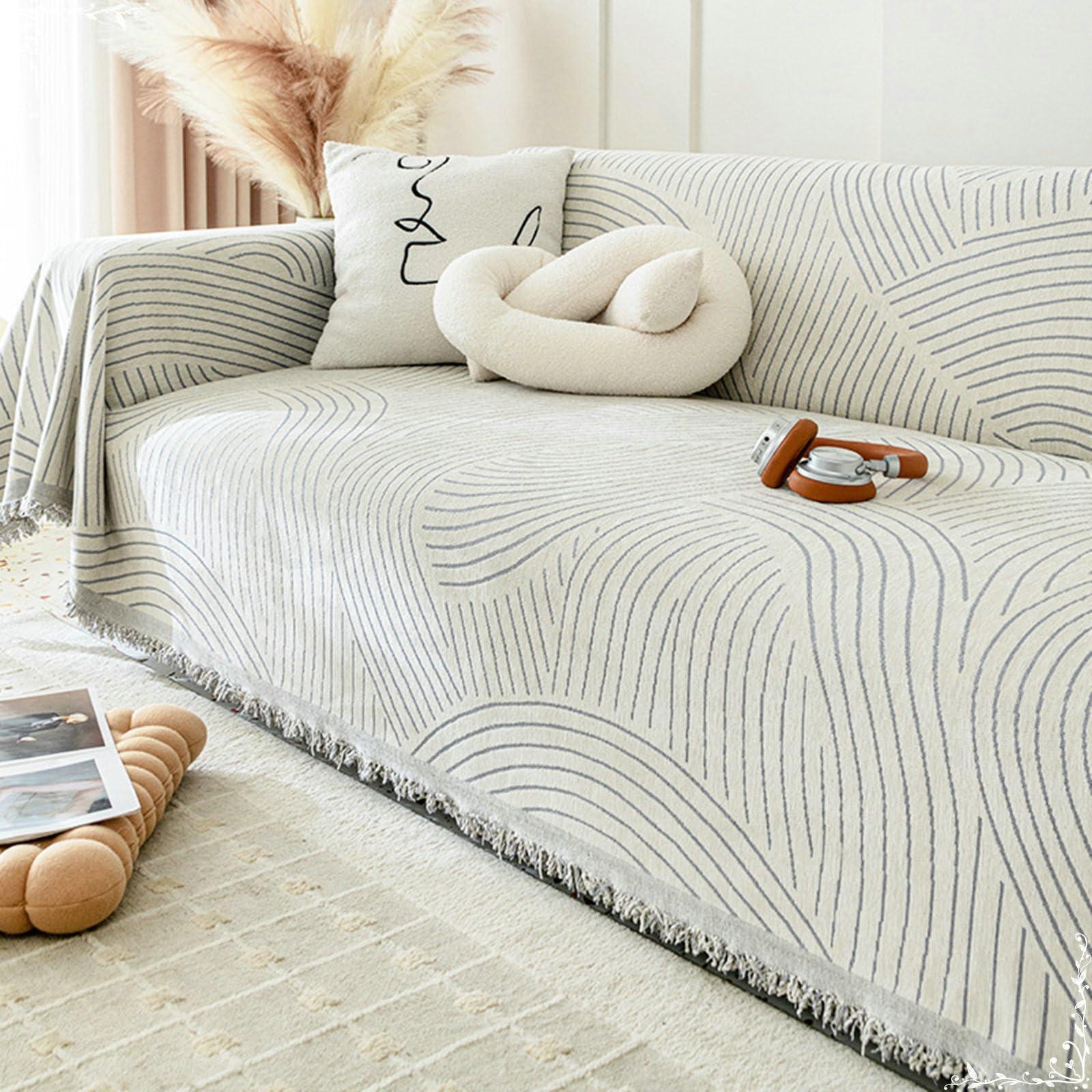 Create a reading nook with vintage chairs and soft throws in the living room