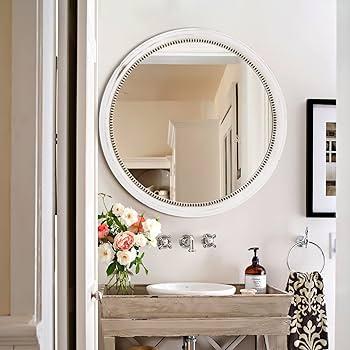 Add vintage‌ mirrors ‌to enhance charm in your boho bathroom