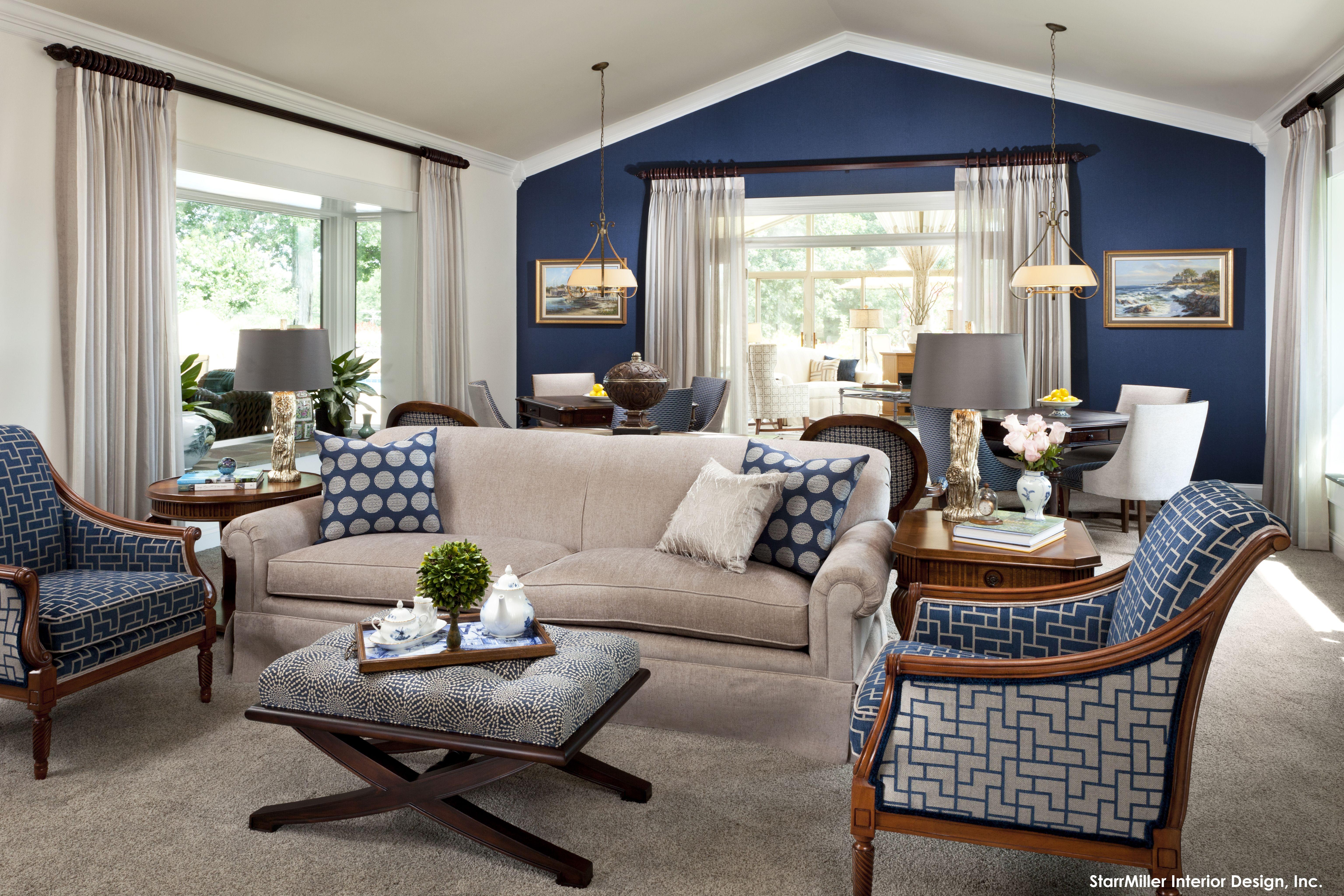 Incorporate navy blue accents for depth in your blue living room