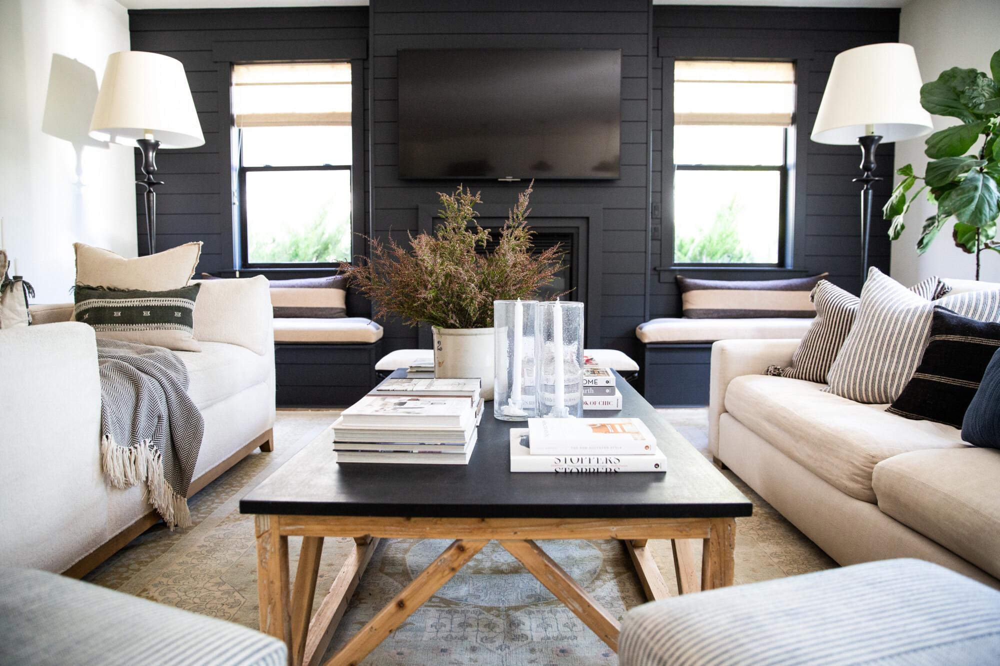 Incorporate various textures with throws and pillows for a layered contemporary living room look