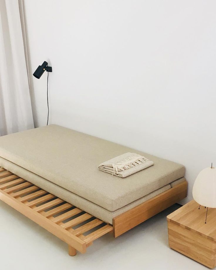 Guest Bed with a soft beige woollen fabric. From daybed to double bed. #bautier #guestbed