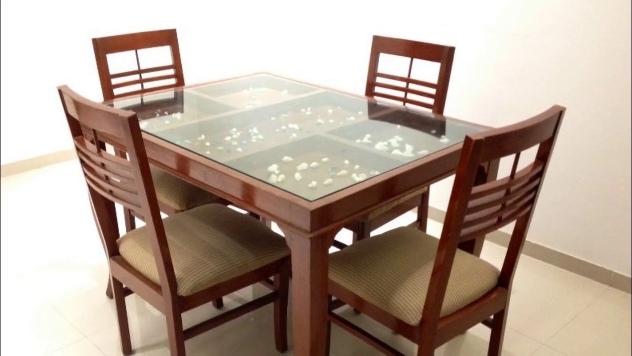 A great replacement for a traditional wooden table: glass top dining table